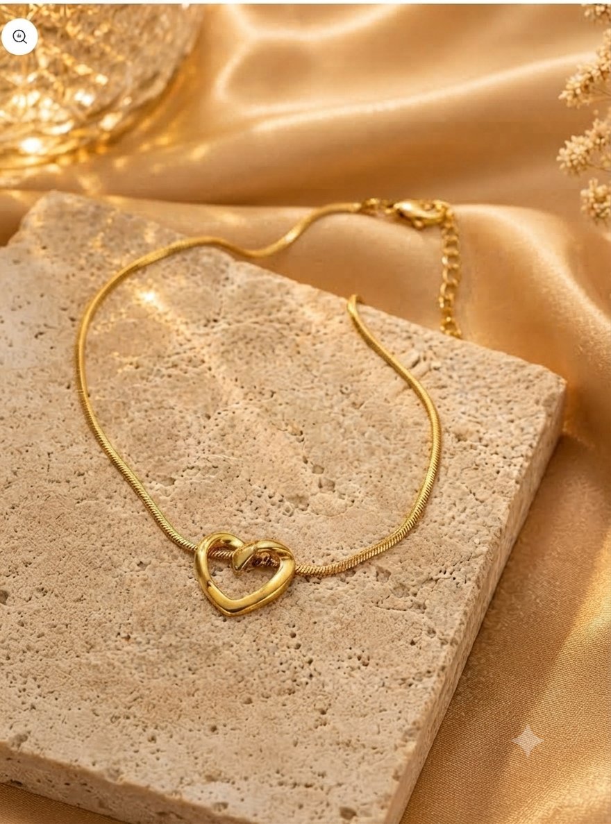 Heart pendant gold chain necklace with anti-tarnish finish for women, featuring a delicate heart-shaped design.