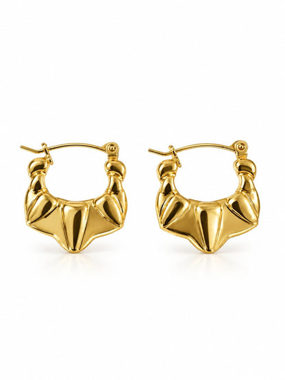 Golden sculpted statement hoop earrings with anti-tarnish finish for women, featuring a bold geometric design.