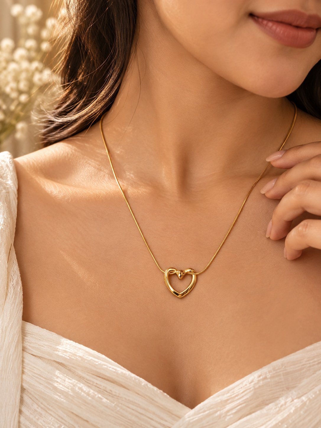 Heart pendant gold chain necklace with anti-tarnish finish for women, featuring a delicate heart-shaped design.