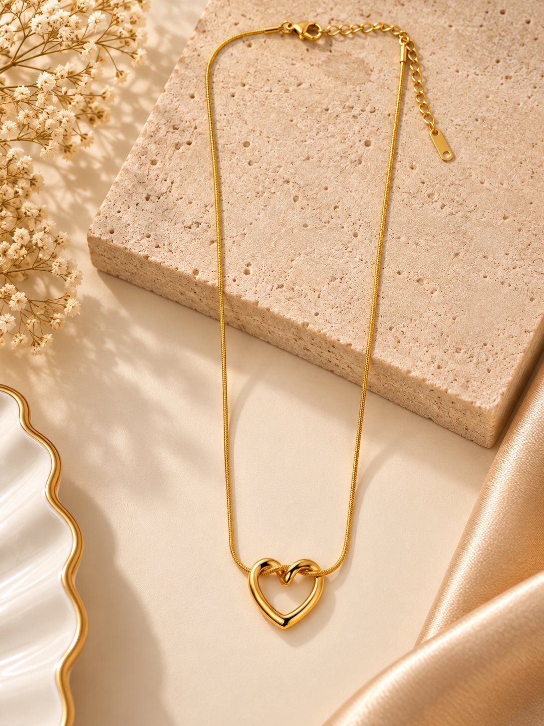 Heart pendant gold chain necklace with anti-tarnish finish for women, featuring a delicate heart-shaped design.